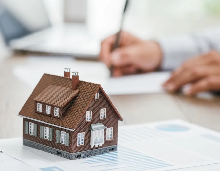 Attorney reviewing mortgage documents for home purchase